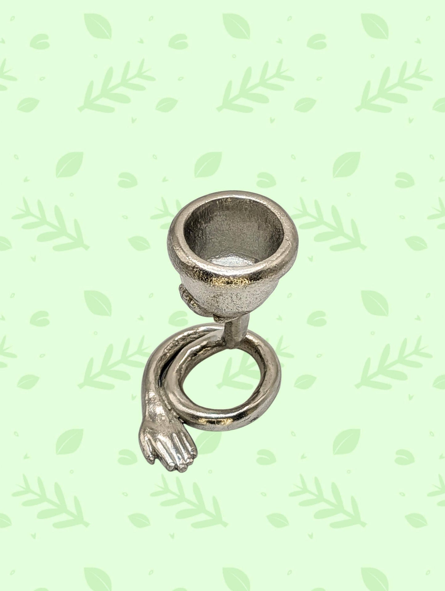 Handcrafted lead-free pewter left hands surrealist taper & tea light candle