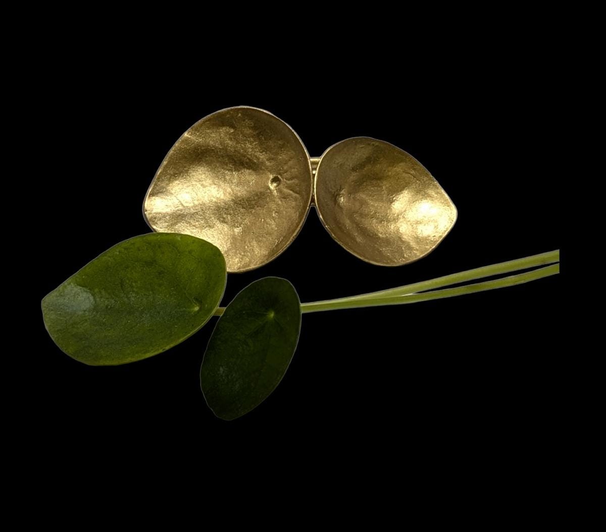 Juego de 4 servilleteros de peltre ajustables con diseño de planta de dinero, inspirados en la naturaleza.