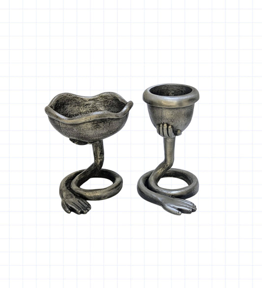 Handcrafted lead-free pewter left hands surrealist taper & tea light candle